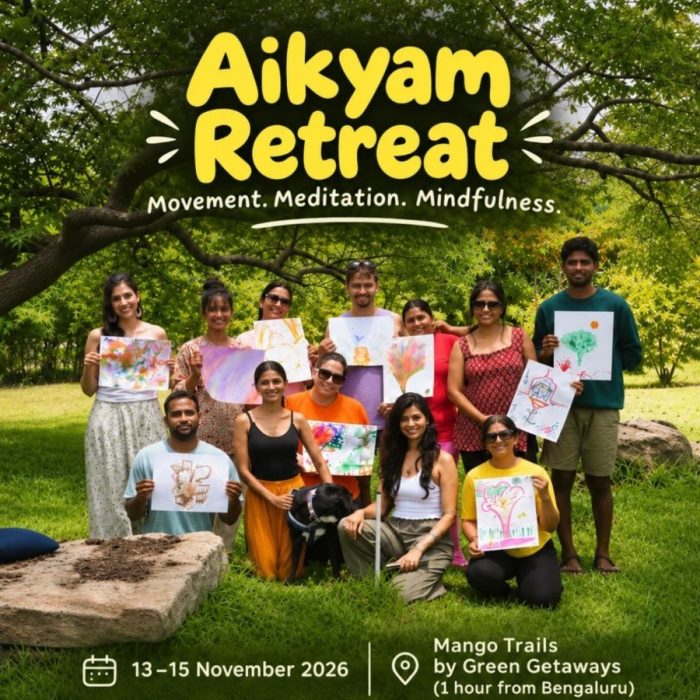 Aikyam Retreat: guests holding up their nature art on the lawn at Mango Trails